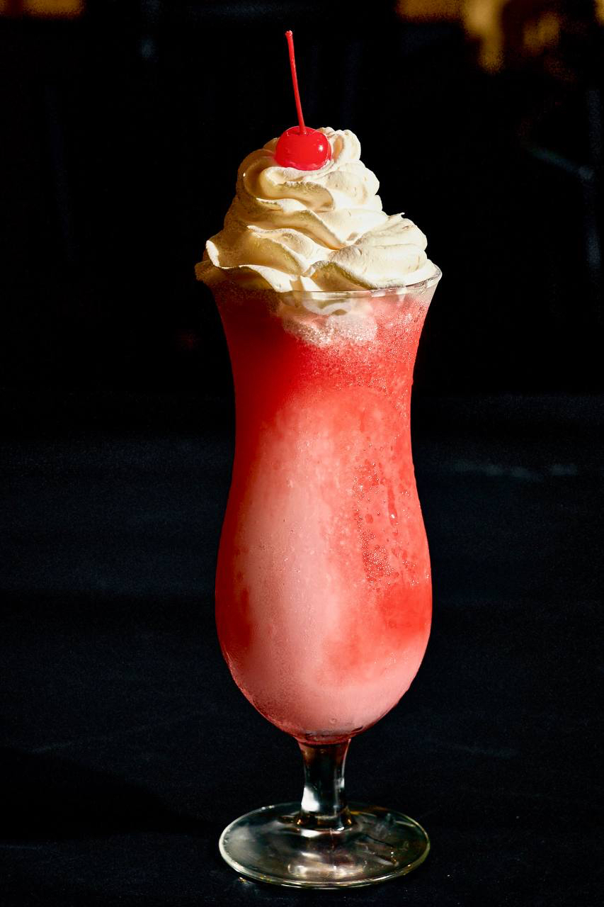 Frozen strawberry cocktail with whipped cream at Pirate's Table bar